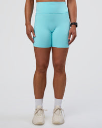 Woman wearing Fusion Ultra High-Rise 6" Short Pockets - Baltic Sea | Set:true | Angle:front | Model:Sav | Size:S | Thumbnail Index: 5