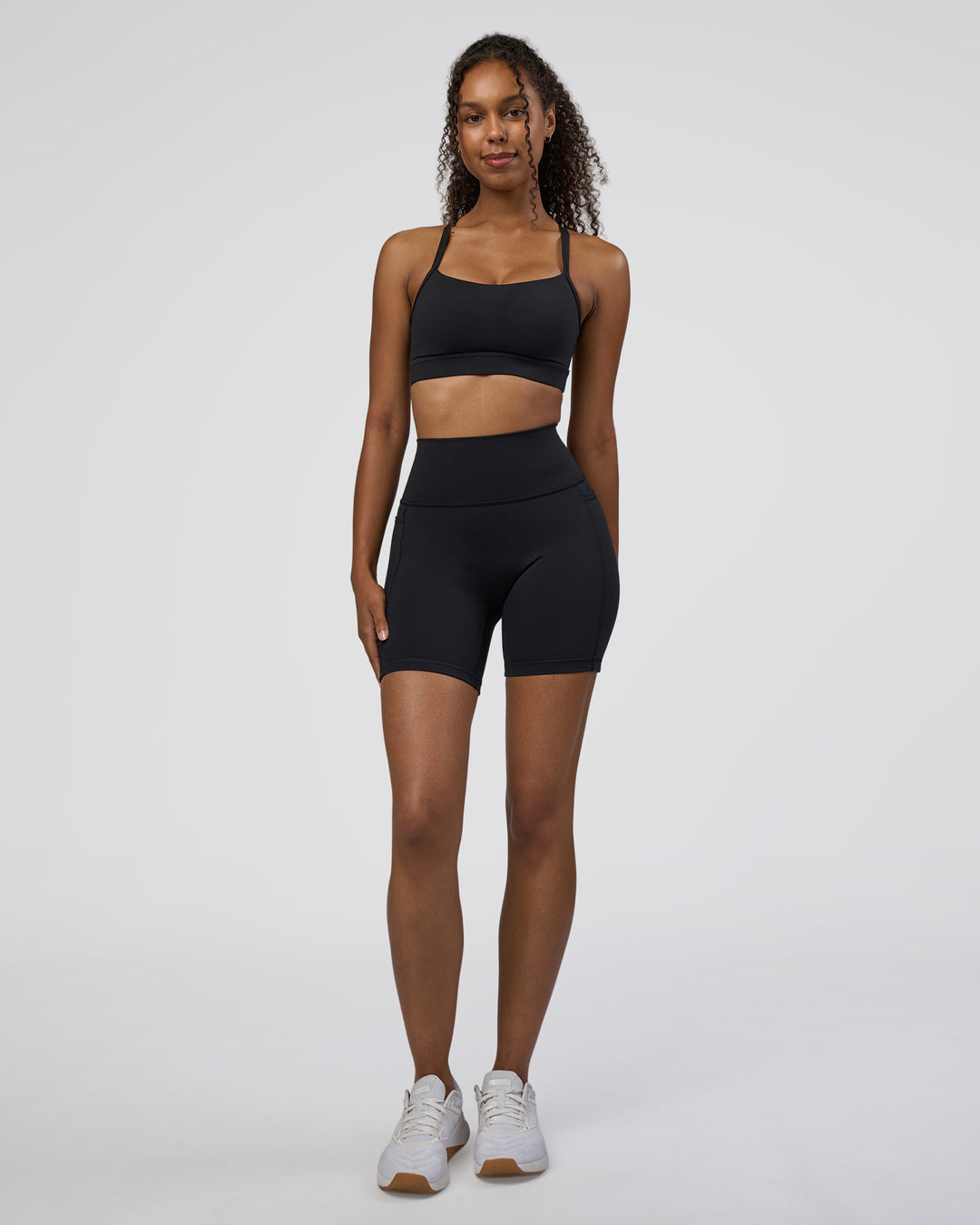 Woman wearing Fusion Ultra High-Rise 6" Short Pockets - Black | Model:Jordan | Size:S - view 2