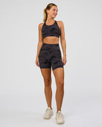 Woman wearing Fusion Ultra High-Rise 6" Short Pockets - Black Tie Dye | Model:Amity | Size:S | Thumbnail Index: 2