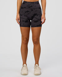Woman wearing Fusion Ultra High-Rise 6" Short Pockets - Black Tie Dye | Set:true | Angle:front | Model:Amity | Size:S | Thumbnail Index: 6