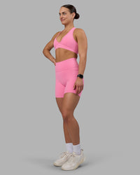 Woman wearing Fusion Ultra High-Rise 6" Short Pockets - Candy Pink | Model:Keisha | Size:S | Thumbnail Index: 2