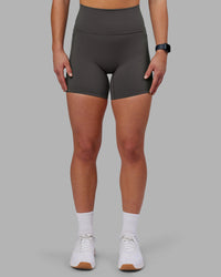 Woman wearing Fusion Ultra High-Rise 6" Short Pockets - Dark Storm | Model:Keisha | Size:S | Thumbnail Index: 0