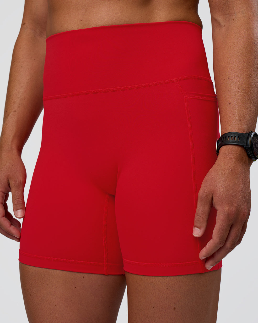 Woman wearing Fusion Ultra High-Rise 6" Short Pockets - Flame | Model:Sav | Size:S - view 6