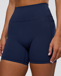 Woman wearing Fusion Ultra High-Rise 6" Short Pockets - Future Navy | Model:Amity | Size:S | Thumbnail Index: 5