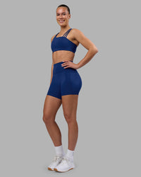 Woman wearing Fusion Ultra High-Rise 6" Short Pockets - Midnight Blue | Model:Charlize | Size:S | Thumbnail Index: 2