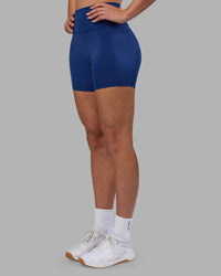 Woman wearing Fusion Ultra High-Rise 6" Short Pockets - Midnight Blue | Model:Charlize | Size:S | Thumbnail Index: 6