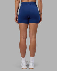 Woman wearing Fusion Ultra High-Rise 6" Short Pockets - Midnight Blue | Model:Charlize | Size:S | Thumbnail Index: 3