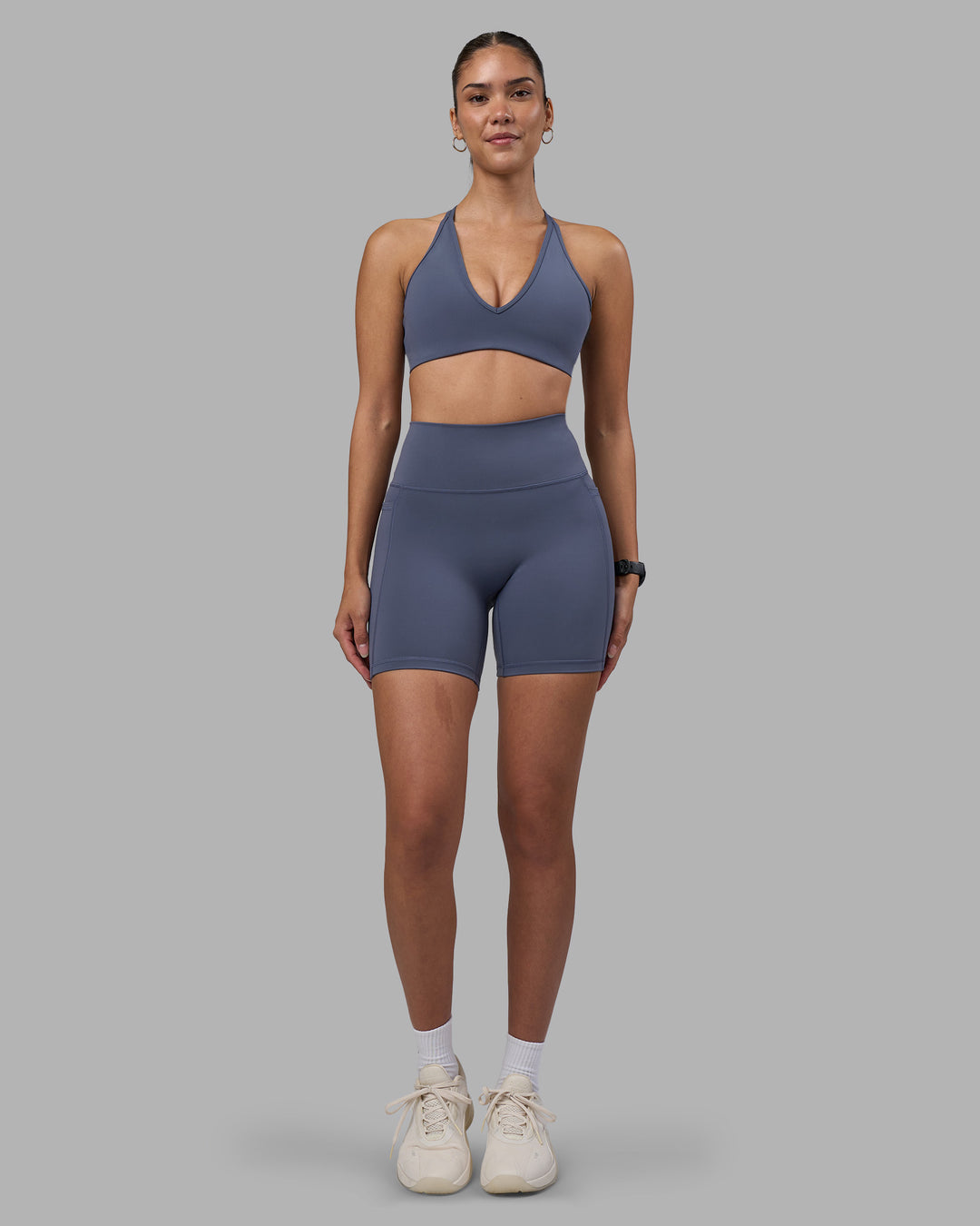 Woman wearing Fusion Ultra High-Rise 6" Short Pockets - Night Shadow | Model:Rhiley | Size:S - view 5