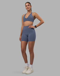Woman wearing Fusion Ultra High-Rise 6" Short Pockets - Night Shadow | Model:Rhiley | Size:S | Thumbnail Index: 1
