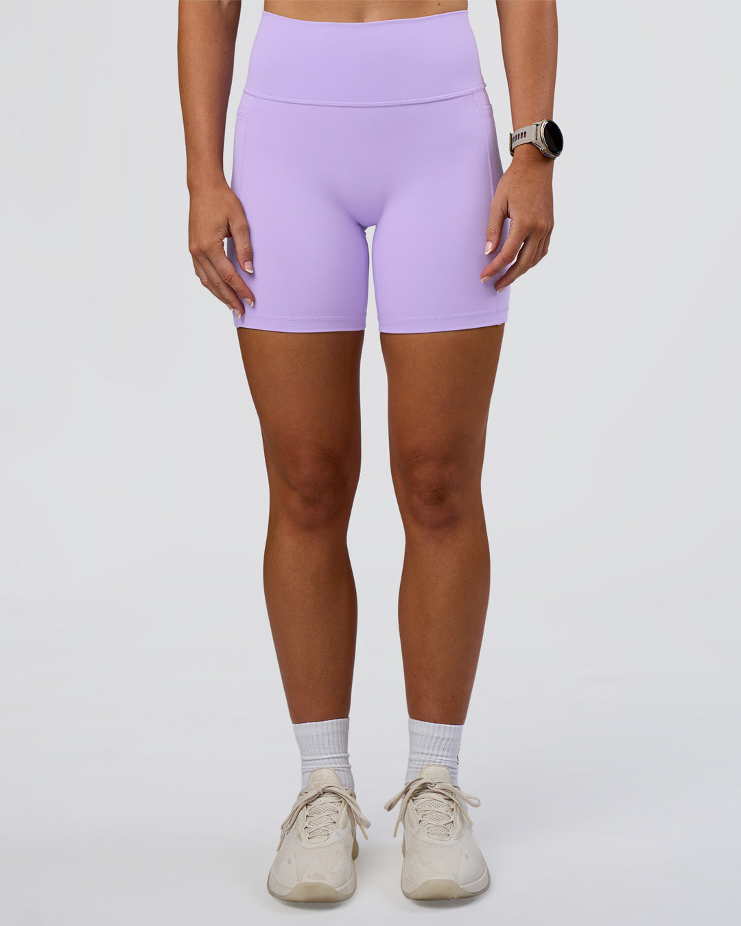 Woman wearing Fusion Ultra High-Rise 6" Short Pockets - Pale Lilac | Set:true | Angle:front | Model:Emelia | Size:S - view 5