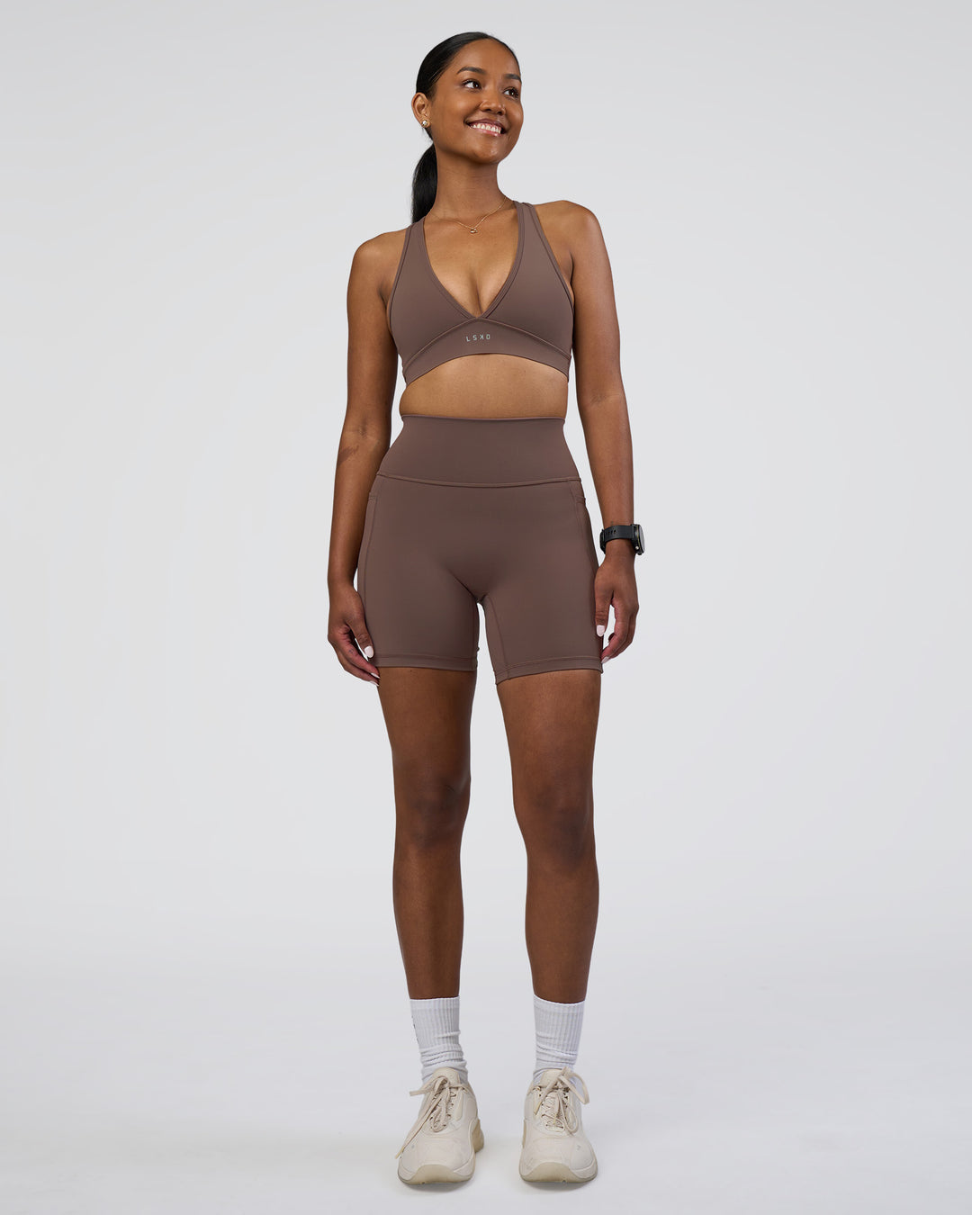 Woman wearing Fusion Ultra High-Rise 6" Short Pockets - Peppercorn | Model:Rica | Size:S - view 2
