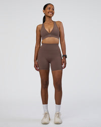 Woman wearing Fusion Ultra High-Rise 6" Short Pockets - Peppercorn | Model:Rica | Size:S | Thumbnail Index: 1