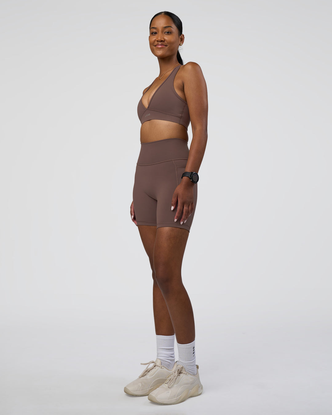 Woman wearing Fusion Ultra High-Rise 6" Short Pockets - Peppercorn | Model:Rica | Size:S - view 5