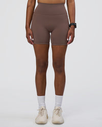 Woman wearing Fusion Ultra High-Rise 6" Short Pockets - Peppercorn | Set:true | Angle:front | Model:Rica | Size:S | Thumbnail Index: 0