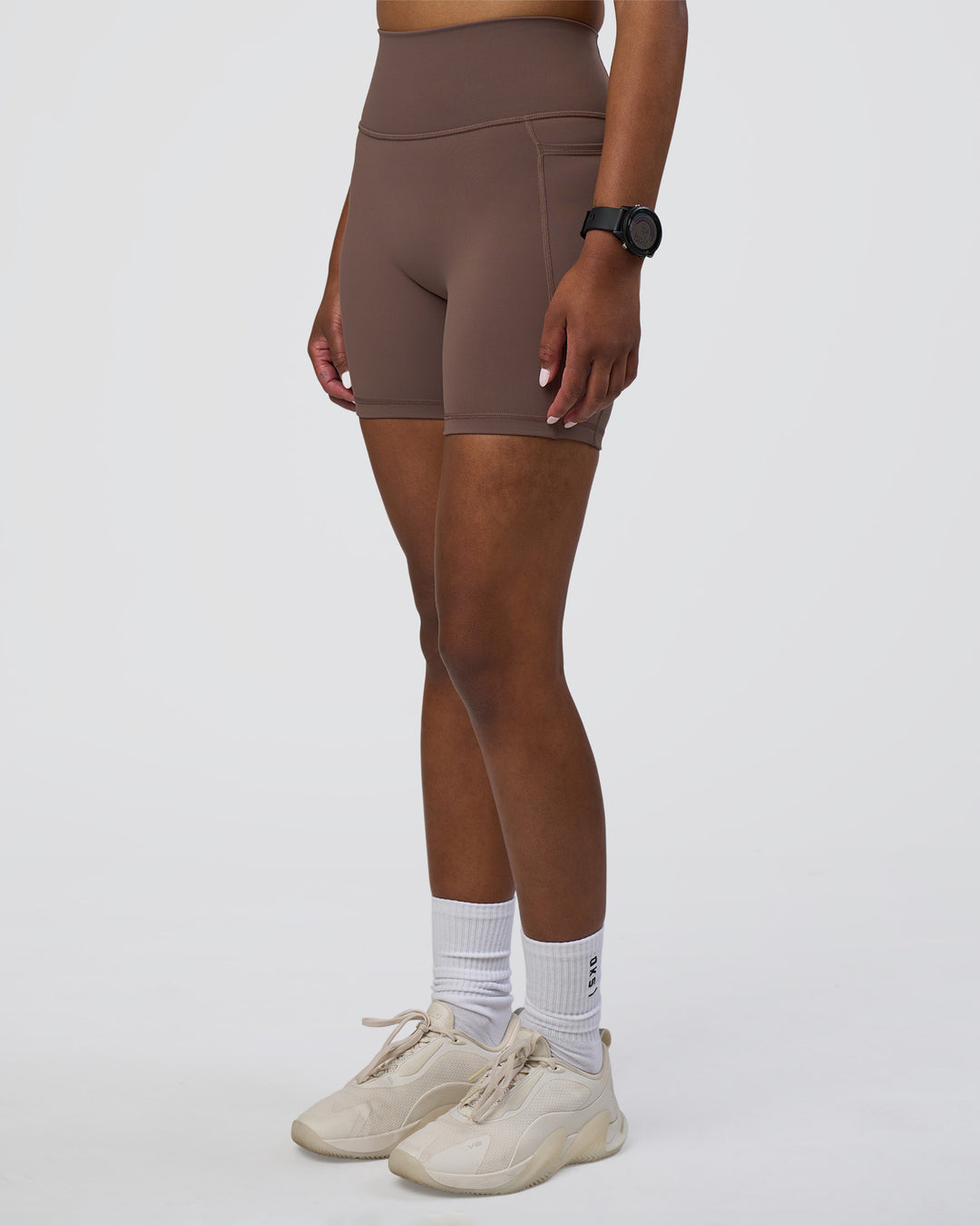 Woman wearing Fusion Ultra High-Rise 6" Short Pockets - Peppercorn | Set:true | Angle:side | Model:Rica | Size:S - view 6