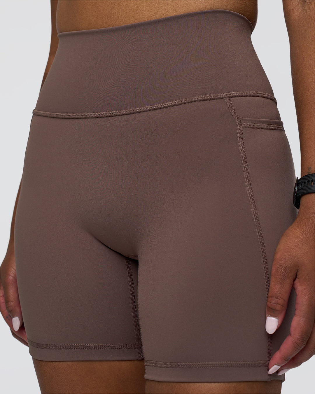 Woman wearing Fusion Ultra High-Rise 6" Short Pockets - Peppercorn | Set:true | Angle:closeup | Model:Rica | Size:S - view 3