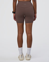 Woman wearing Fusion Ultra High-Rise 6" Short Pockets - Peppercorn | Set:true | Angle:back | Model:Rica | Size:S | Thumbnail Index: 3