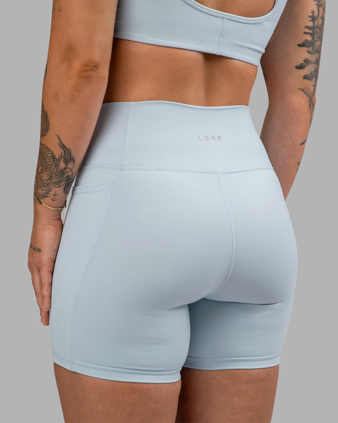 Woman wearing Fusion Ultra High-Rise 6" Short Pockets - Skyride| Model:Robyn | Size:S - view 6