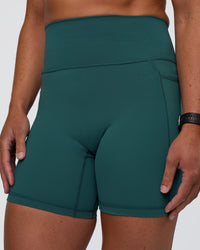 Woman wearing Fusion Ultra High-Rise 6" Short Pockets - Transformative Teal | Model:Sav | Size:S | Thumbnail Index: 5