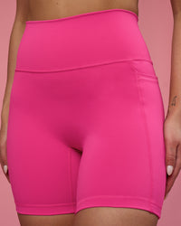 Woman wearing Fusion Ultra High-Rise 6" Short Pockets - Ultra Pink | Model:Hannah | Size:S | Thumbnail Index: 7