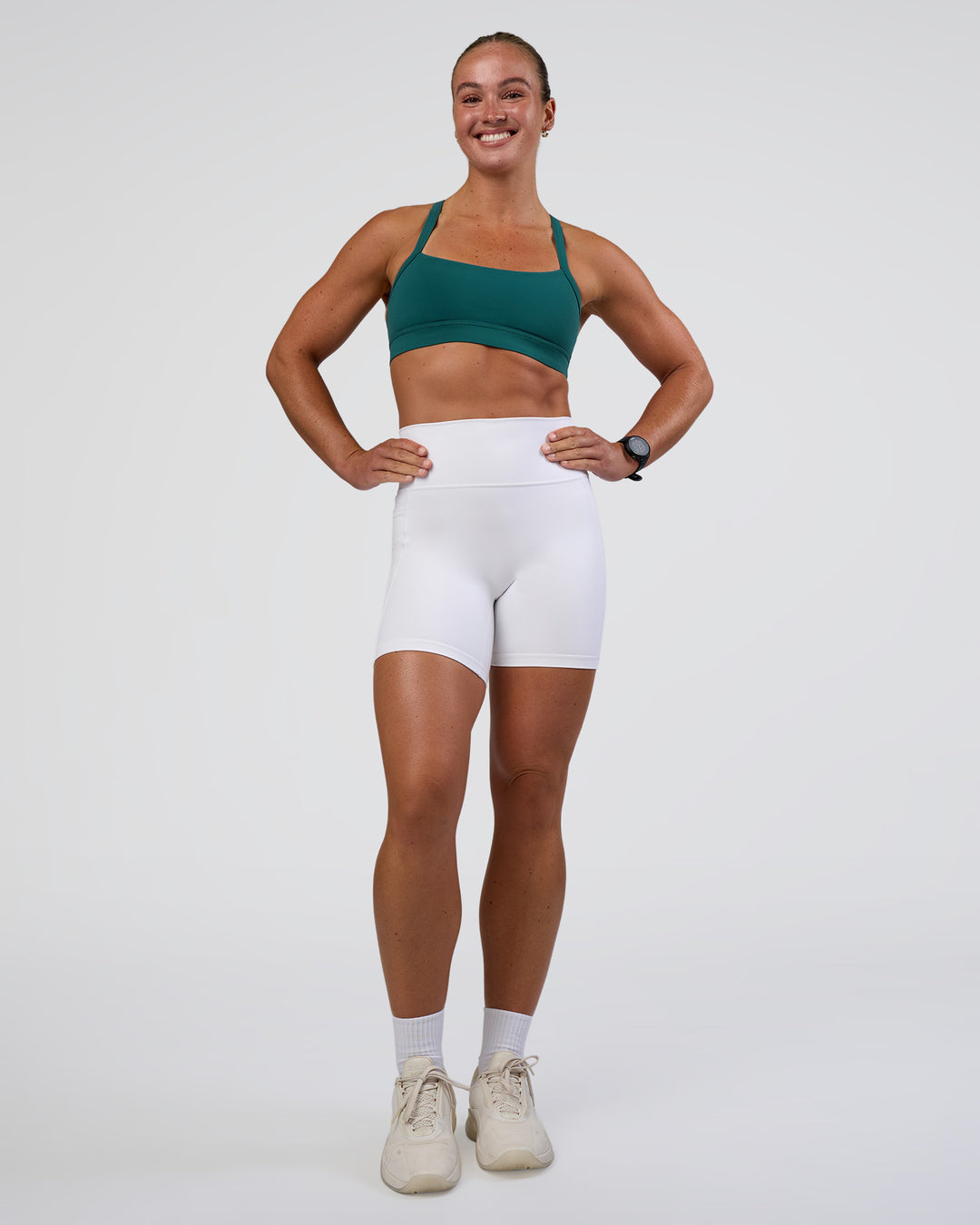 Woman wearing Fusion Ultra High-Rise 6" Short Pockets - White | Model:Sav | Size:S - view 2