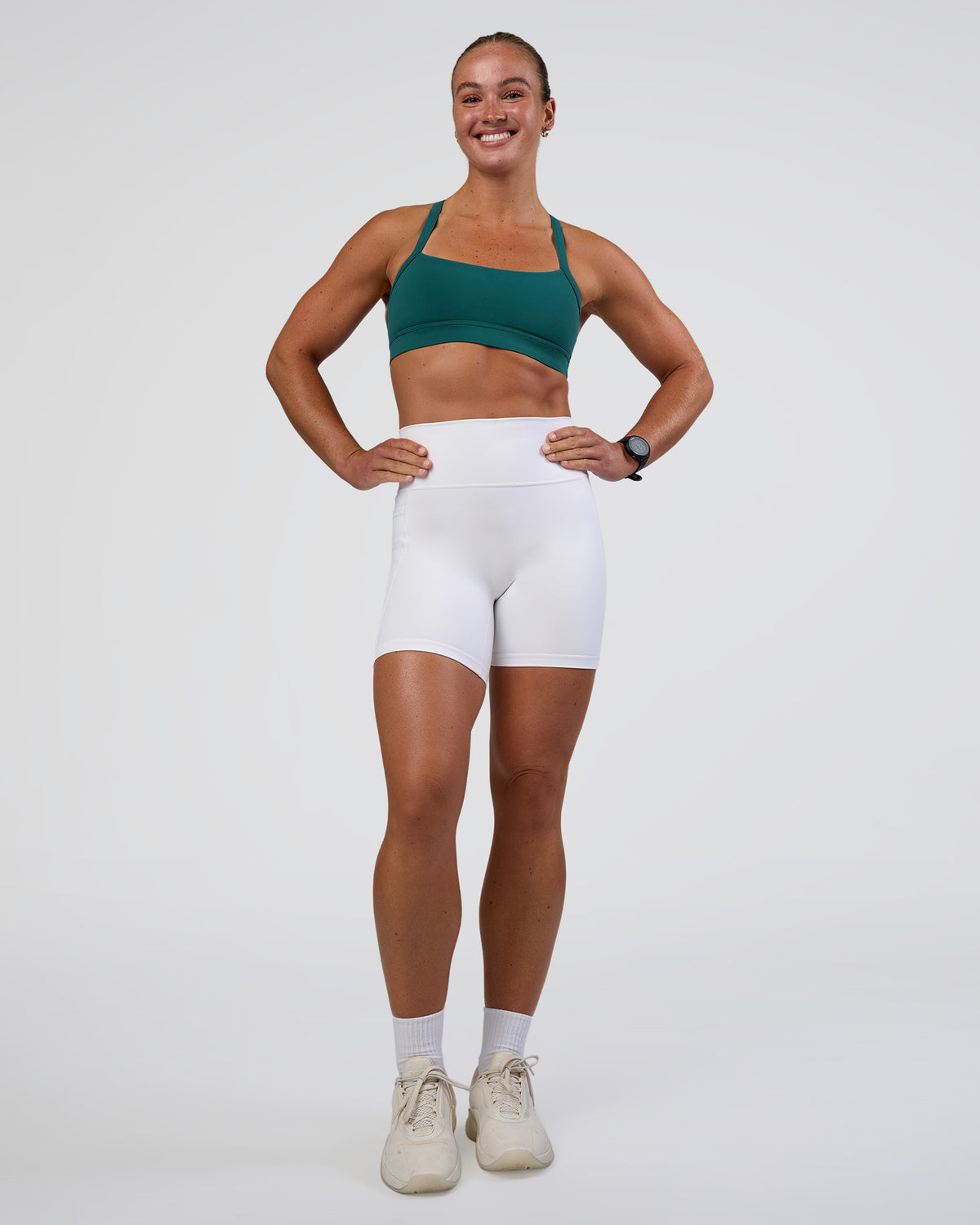 Woman wearing Fusion Ultra High-Rise 6" Short Pockets - White | Model:Sav | Size:S