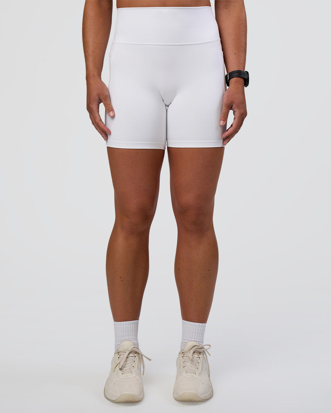 Woman wearing Fusion Ultra High-Rise 6" Short Pockets - White | Set:true | Angle:front | Model:Sav | Size:S - view 6