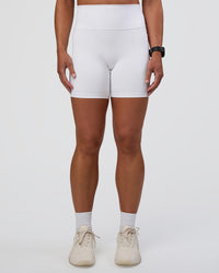 Woman wearing Fusion Ultra High-Rise 6" Short Pockets - White | Set:true | Angle:front | Model:Sav | Size:S | Thumbnail Index: 5