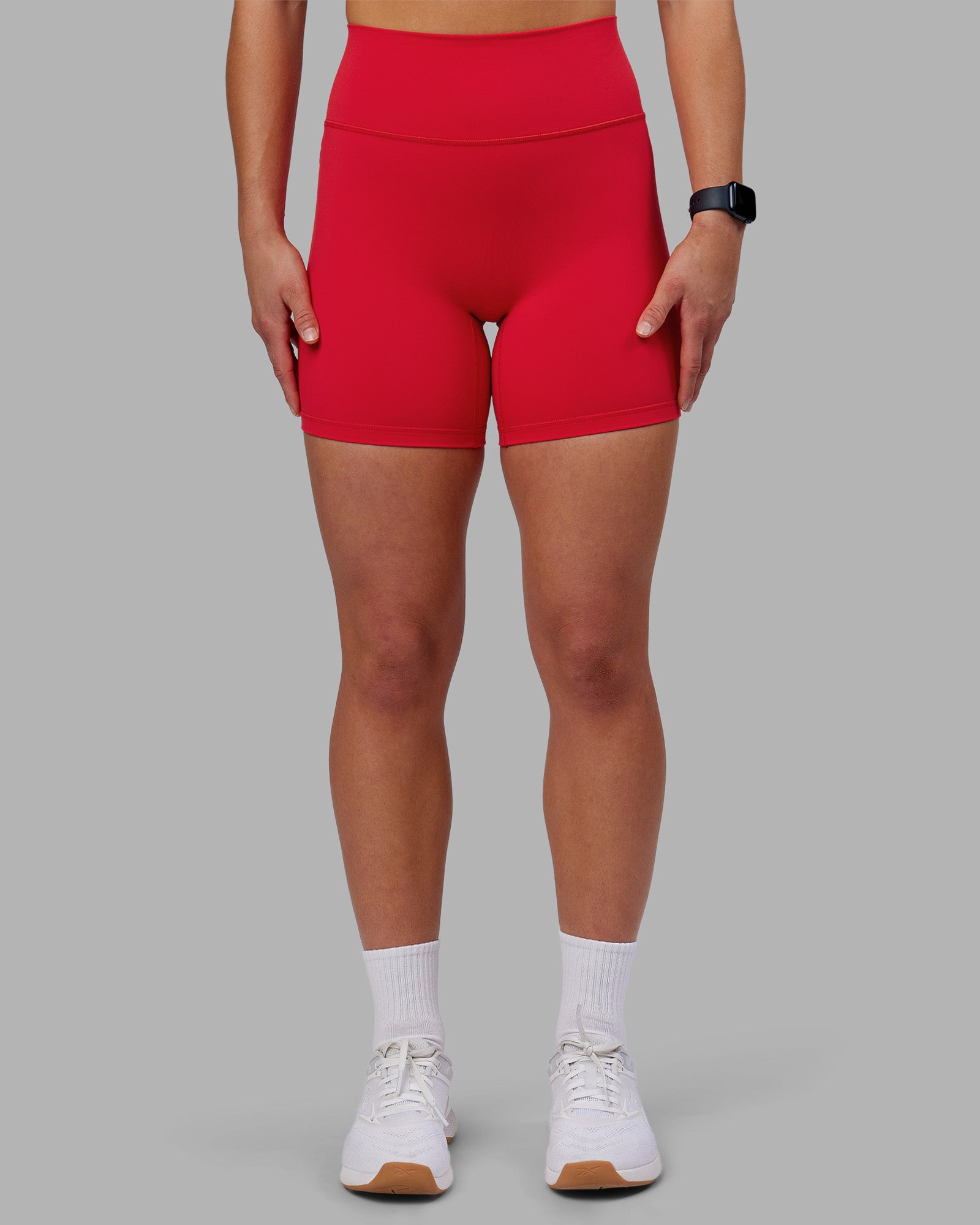Woman wearing Fusion Ultra High-Rise 6" Short - Scarlet | Set:true | Angle:front | Model:Keisha | Size:S