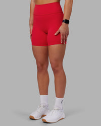 Woman wearing Fusion Ultra High-Rise 6" Short - Scarlet | Set:true | Angle:side | Model:Keisha | Size:S | Thumbnail Index: 6
