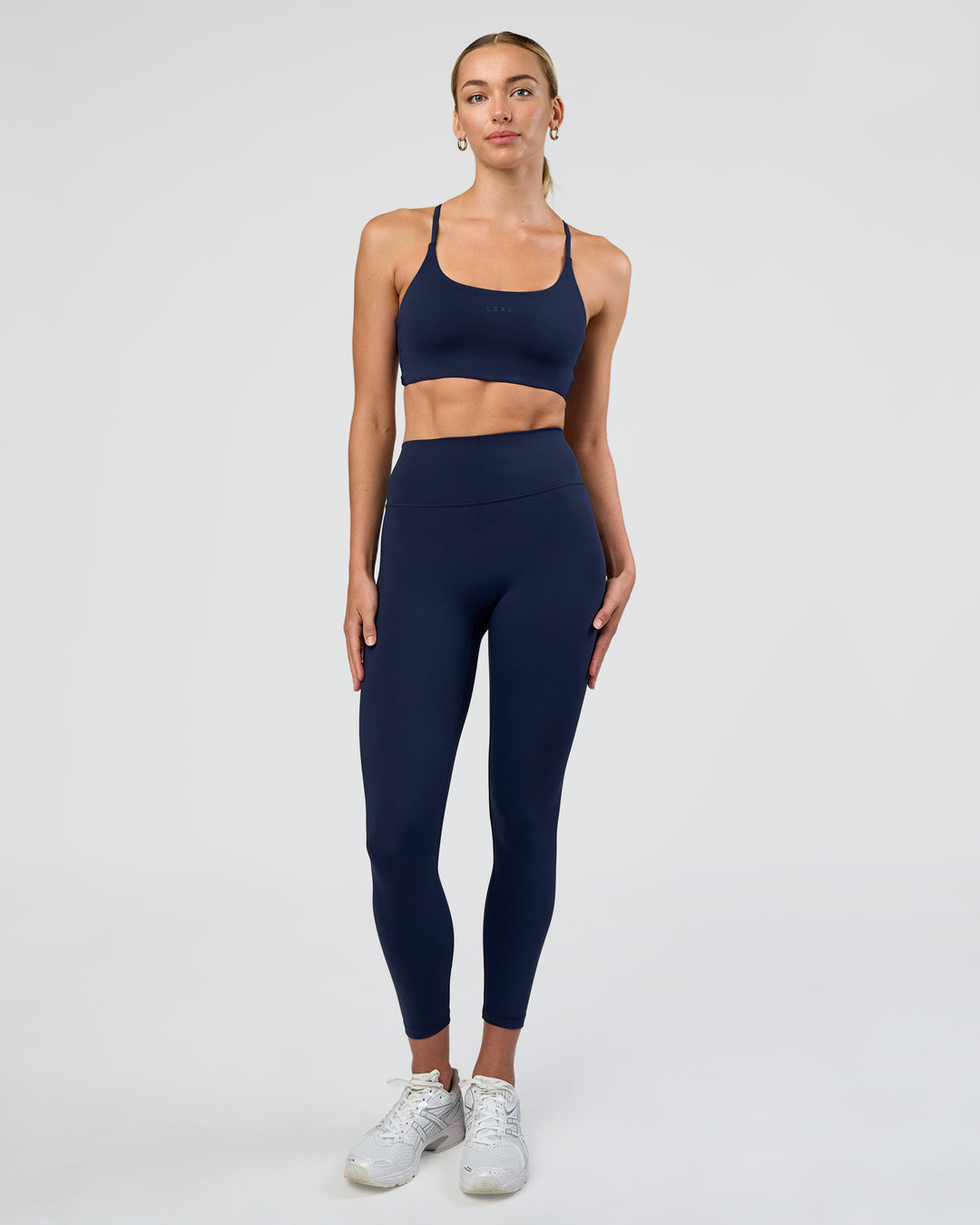 Woman wearing Fusion Ultra High-Rise 7/8 Legging - Future Navy | Model:Evie | Size:S - view 5