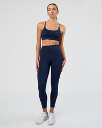 Woman wearing Fusion Ultra High-Rise 7/8 Legging - Future Navy | Model:Evie | Size:S | Thumbnail Index: 4