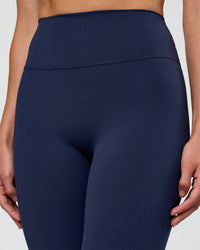 Woman wearing Fusion Ultra High-Rise 7/8 Legging - Future Navy | Model:Evie | Size:S | Thumbnail Index: 2