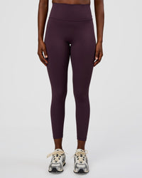 Woman wearing Fusion Ultra High-Rise 7/8 Legging - Midnight Plum | Model:Ellie | Size:S | Thumbnail Index: 0
