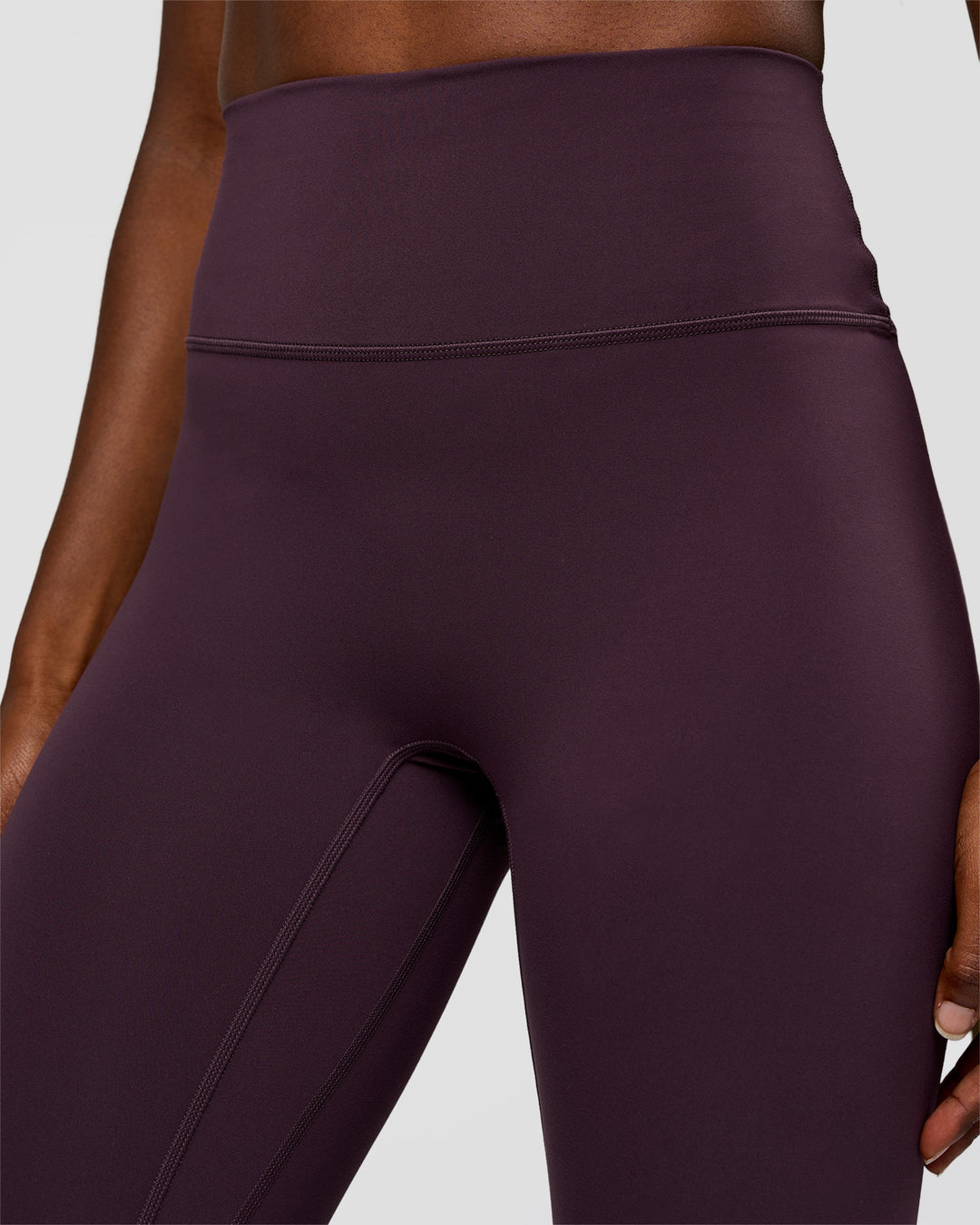 Woman wearing Fusion Ultra High-Rise 7/8 Legging - Midnight Plum | Model:Ellie | Size:S - view 3
