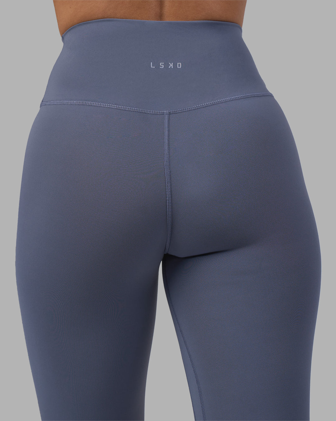 Woman wearing Fusion Ultra High-Rise 7/8 Legging - Night Shadow | Model:Rhiley | Size:S - view 7