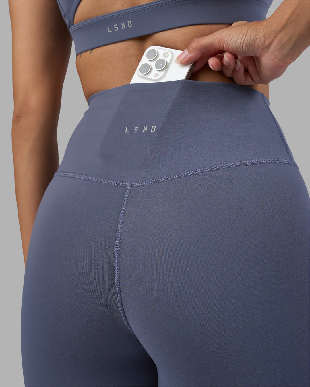 Woman wearing Fusion Ultra High-Rise 7/8 Legging - Night Shadow | Model:Rhiley | Size:S - view 2