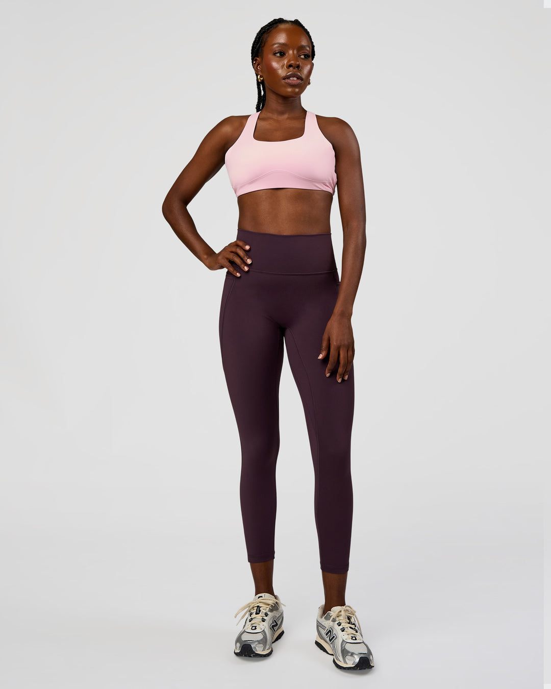 Woman wearing Fusion Ultra High-Rise 7/8 Legging Pockets - Midnight Plum | Model:Ellie | Size:S - view 5