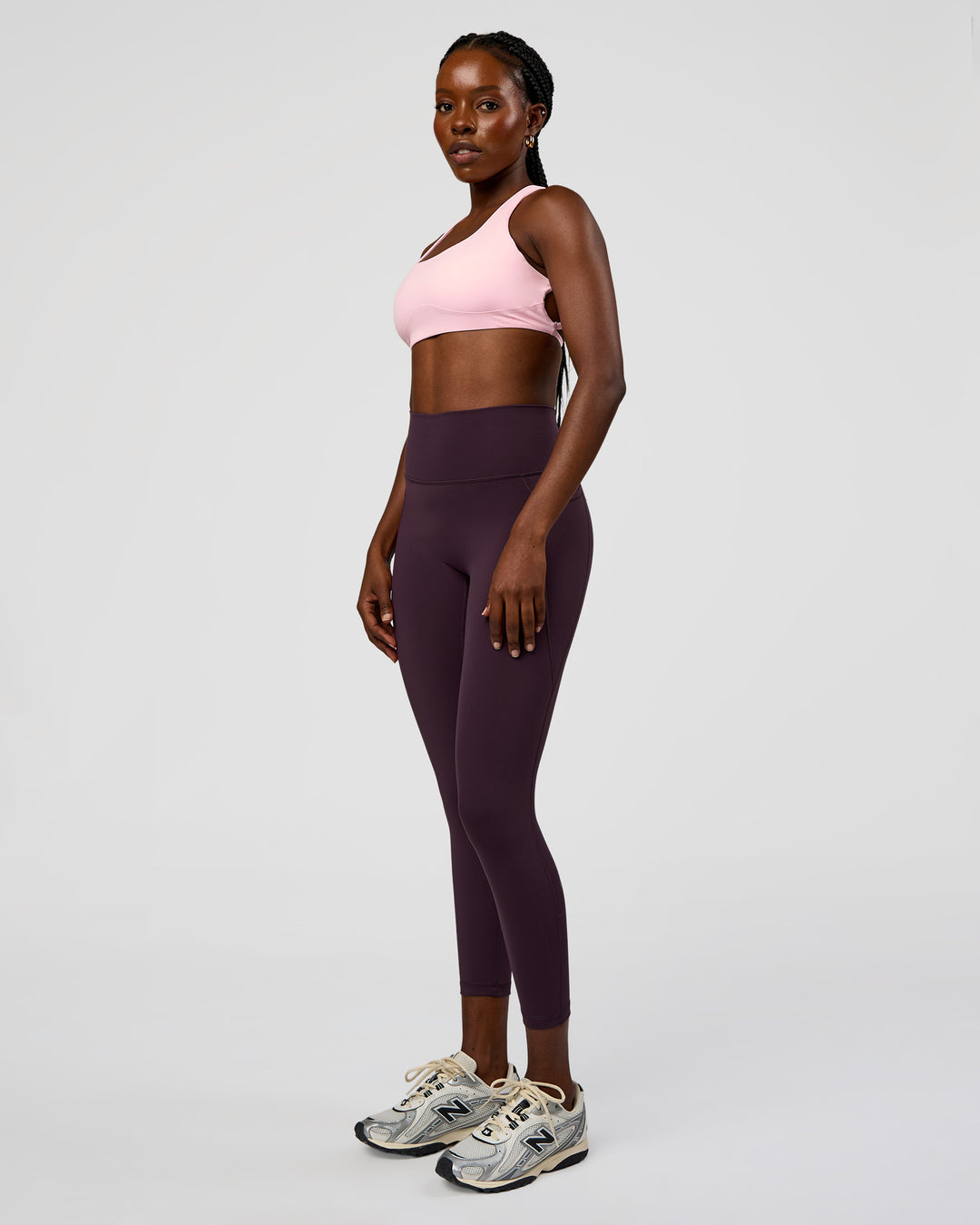 Woman wearing Fusion Ultra High-Rise 7/8 Legging Pockets - Midnight Plum | Model:Ellie | Size:S - view 6