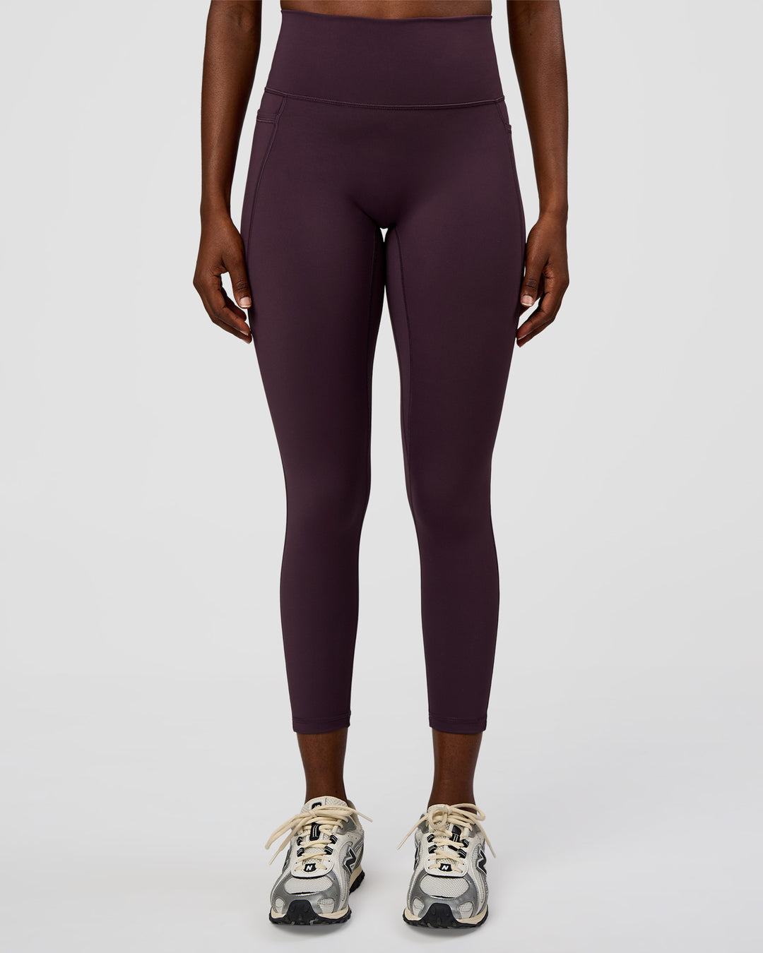 Woman wearing Fusion Ultra High-Rise 7/8 Legging Pockets - Midnight Plum | Model:Ellie | Size:S - view 2