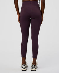 Woman wearing Fusion Ultra High-Rise 7/8 Legging Pockets - Midnight Plum | Model:Ellie | Size:S | Thumbnail Index: 3