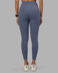 Woman wearing Fusion Ultra High-Rise 7/8 Legging Pockets - Night Shadow | Model:Rhiley | Size:S | Thumbnail Index: 3