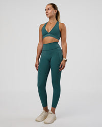 Woman wearing Fusion Ultra High-Rise 7/8 Legging Pockets - Transformative Teal | Model:Myrte | Size:S | Thumbnail Index: 4
