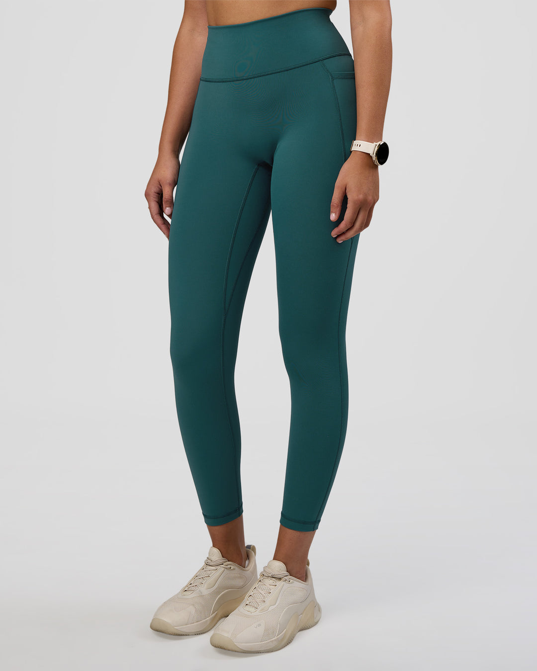 Woman wearing Fusion Ultra High-Rise 7/8 Legging Pockets - Transformative Teal | Model:Myrte | Size:S - view 6