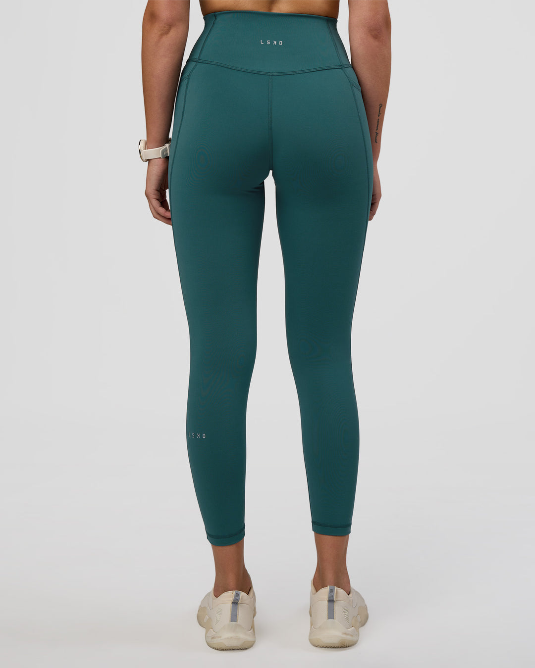  Woman wearing Fusion Ultra High-Rise 7/8 Legging Pockets - Transformative Teal | Model:Myrte | Size:S - view 4