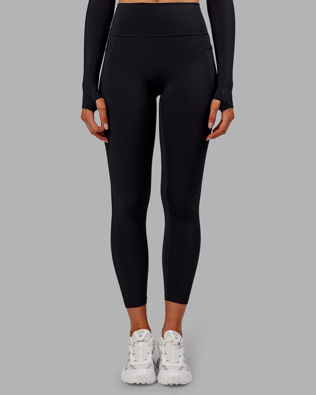 Woman wearing Fusion Ultra High-Rise 7/8 Thermal Legging Pockets - Black | Model:Ella | Size:S - view 2