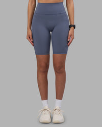 Woman wearing Fusion Ultra High-Rise 9" Short Pockets - Night Shadow | Model:Rhiley | Size:S | Thumbnail Index: 6