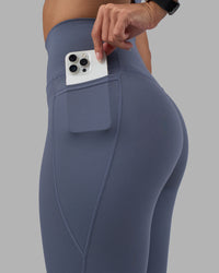 Woman wearing Fusion Ultra High-Rise 9" Short Pockets - Night Shadow | Model:Rhiley | Size:S | Thumbnail Index: 2