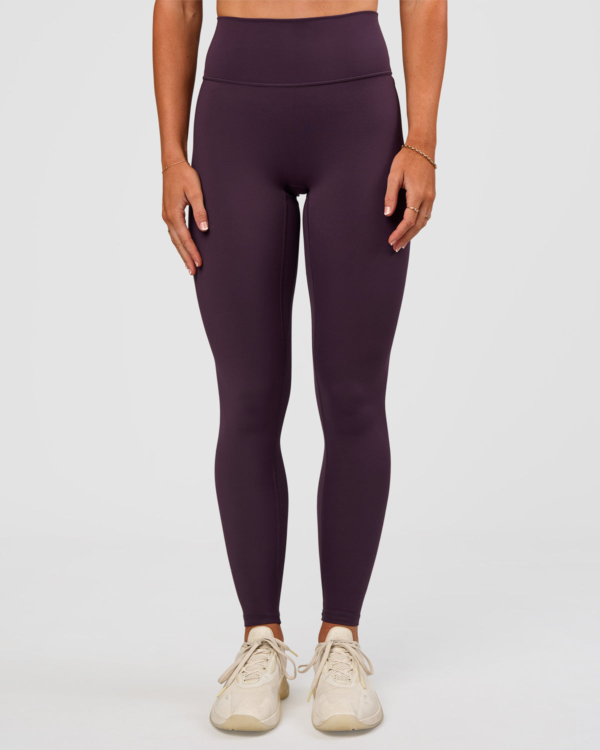 Woman wearing Fusion Ultra High-Rise Full Length Legging - Midnight Plum | Model:Emelia | Size:S