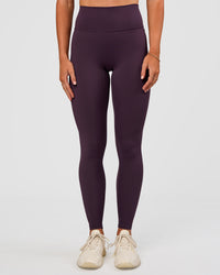 Woman wearing Fusion Ultra High-Rise Full Length Legging - Midnight Plum | Model:Emelia | Size:S | Thumbnail Index: 1